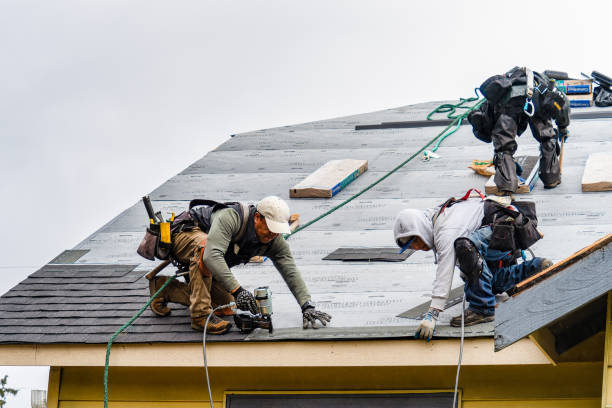Professional Roofing technician working in Upland, CA